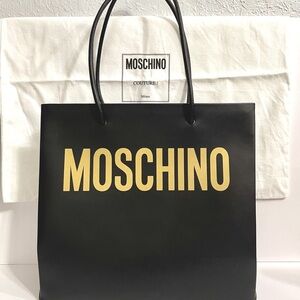 Moschino
logo print leather tote bag